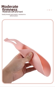 Detailed close-up of flexible pink silicone kitchen rest showing its soft material texture