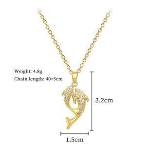 Detailed view of dolphin pendant with measurements 3.2cm height and 40+5cm chain