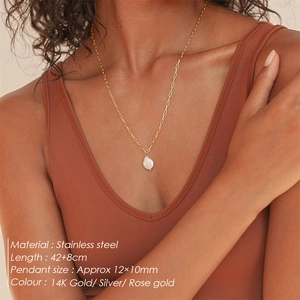 Y-shaped stainless steel necklace with baroque pearl pendant shown on a model