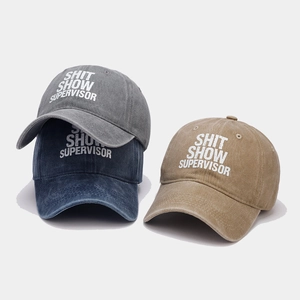 Washed cotton baseball cap with Shit Show Supervisor text in grey, navy and khaki