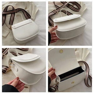 Detailed four-angle view of white saddle bag showing interior capacity and striped strap