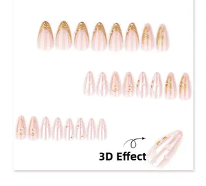 Close-up of 3D wave texture and gold embossed details on almond-shaped press-on nails