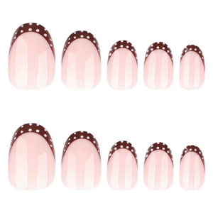 Short round French press-on nails in brown with white dots for autumn and winter