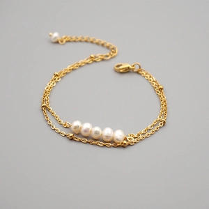 Double-layer gold plated titanium steel bracelet with natural freshwater pearls for women