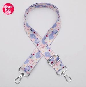 Detail of adjustable floral crossbody strap No. 639 with silver metal lobster clasps