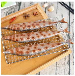 Detailed realistic grilled saury fish model on a wire rack with spices and chopsticks