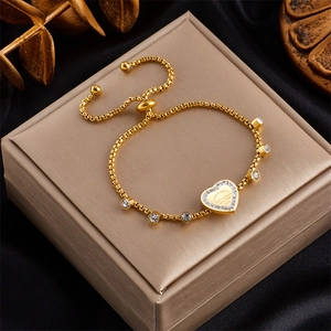 Gold plated titanium steel bracelet with heart pendant and sparkling zircon accents