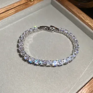 Elegant tennis bracelet with brilliant square zirconia in a luxury velvet jewelry gift box