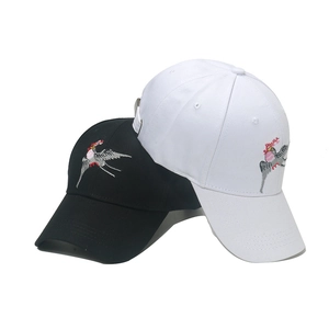 Black and white baseball caps with colorful bird embroidery in vintage Chinese style