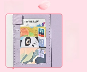 Detail of A6 PU leather budget binder showing internal card slots for organization