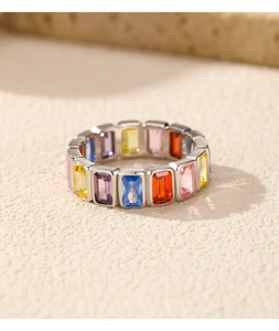 Detail of s925 silver rainbow ring featuring vibrant emerald-cut colorful gemstones