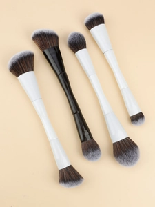 Detailed view of dual-ended makeup brushes with bionic synthetic bristles and sleek handles