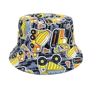 Detailed top view of reversible kids bucket hat with colorful construction vehicle prints