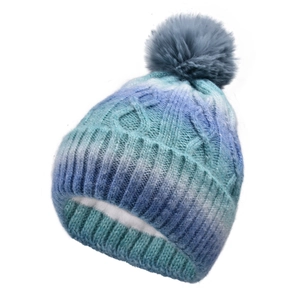 Detailed view of the thick fleece lining inside the gradient blue knitted winter beanie