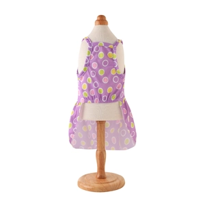 Detail of light purple polka dot pet dress on a wooden hanger with tiered skirt