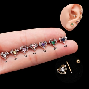 Macro shot of colorful heart zircon stud earrings with surgical steel screw-back posts
