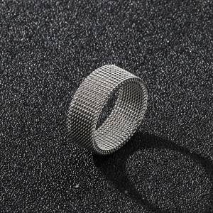 8mm silver stainless steel mesh ring with a geometric woven structure on black background