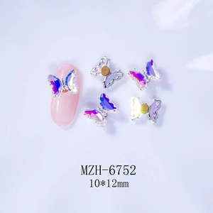 Detail of 10x12mm rotating butterfly nail charms with aurora pink crystal wings