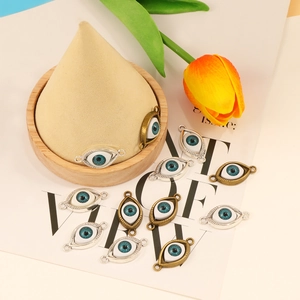 Alloy evil eye charm pendants in bronze and silver finishes for DIY jewelry making