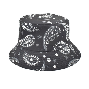 Women's reversible black paisley bucket hat with vintage sun protection floral pattern