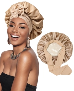 Detail of champagne satin hair bonnet with adjustable long ribbons for hair protection