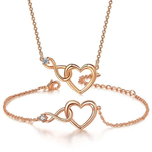 Rose gold necklace and bracelet set with infinity heart design and clear gemstones