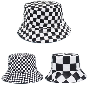 Three reversible checkered bucket hats with varied black and white pattern sizes on white base