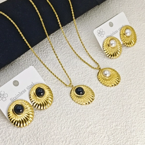 Textured shell pendant necklace and stud earring set with pearls in stainless steel