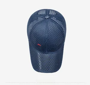 Detail of navy blue mesh baseball cap with white FARD embroidery and breathable design