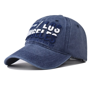 Detail view of vintage washed denim baseball cap with Los Angeles 3D embroidery