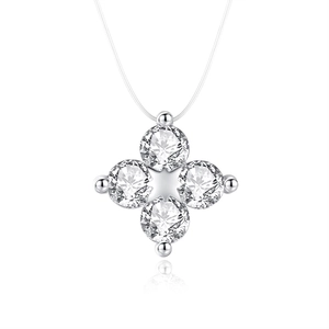 Collana con ciondolo a fiore in argento e quattro zirconi con filo trasparente