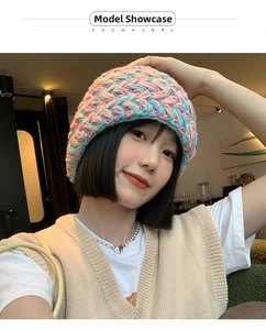 Close-up of colorful chunky knit beanie showing thick texture and pastel blend