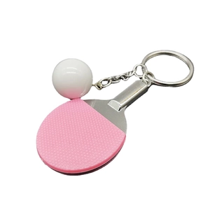 Mini pink ping pong paddle keychain with a small white ball on a silver keyring