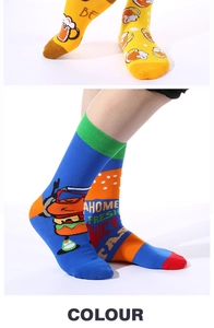 Detail view of cotton crew socks featuring hamburger and beer patterns with juicy text