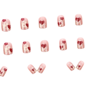 Short nude pink heart press on nails with glitter finish and translucent crystal effect