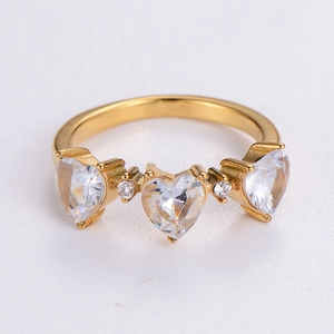 Gold stainless steel heart zircon ring with three heart-shaped clear gemstones
