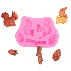 Pink silicone squirrel and pine cone fondant mold for woodland cake decoration