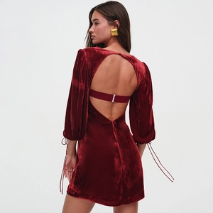 Sexy backless red velvet mini dress with long sleeves and metallic strap detail