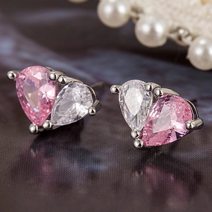 Elegant heart earrings featuring pink and white pear-cut cubic zirconia in silver setting