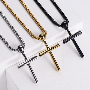 Three-color baseball cross necklaces in gold, silver and black on white display stand