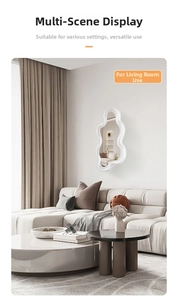 Detail of a white wavy irregular wall mirror in a modern minimalist living room setting