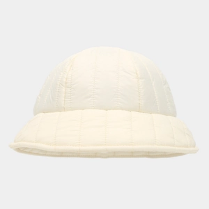 Detailed close-up of ivory quilted winter bucket hat with vertical stitching texture