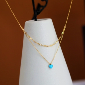 Double layered 18K gold plated stainless steel necklace with blue heart opal pendant