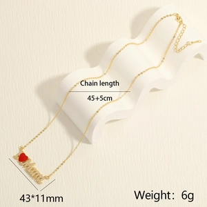 Detail view of I Love MOM pendant with red enamel heart and pavé cubic zirconia