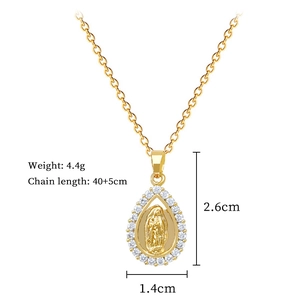 Detail view of gold titanium steel necklace with Virgin Mary relief and zircon stones