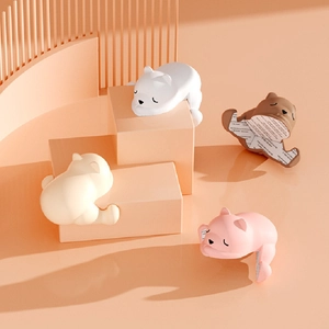 Paraspigoli in silicone a forma di orsetto per sicurezza bambini in quattro colori