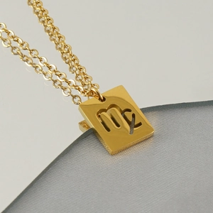 Golden Virgo zodiac square pendant necklace in polished stainless steel on mirror