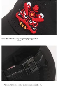 Detail of traditional lion dance embroidery on a black mesh breathable summer sun hat