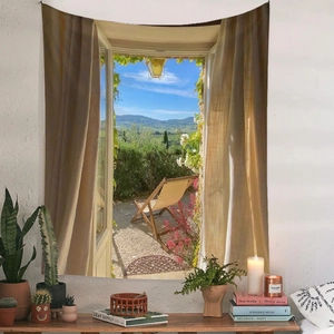 Detail of bohemian tapestry showing a Tuscany window view scenery on a white wall