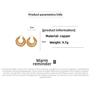 Detail view of gold-plated woven circle earrings showing 3cm diameter and 9.7g weight info